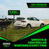 SUV towing boat trailer on beach with 3,500lb load capacity callout, USA tested